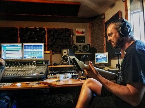 Polo recording guitars at Trempol Studios
